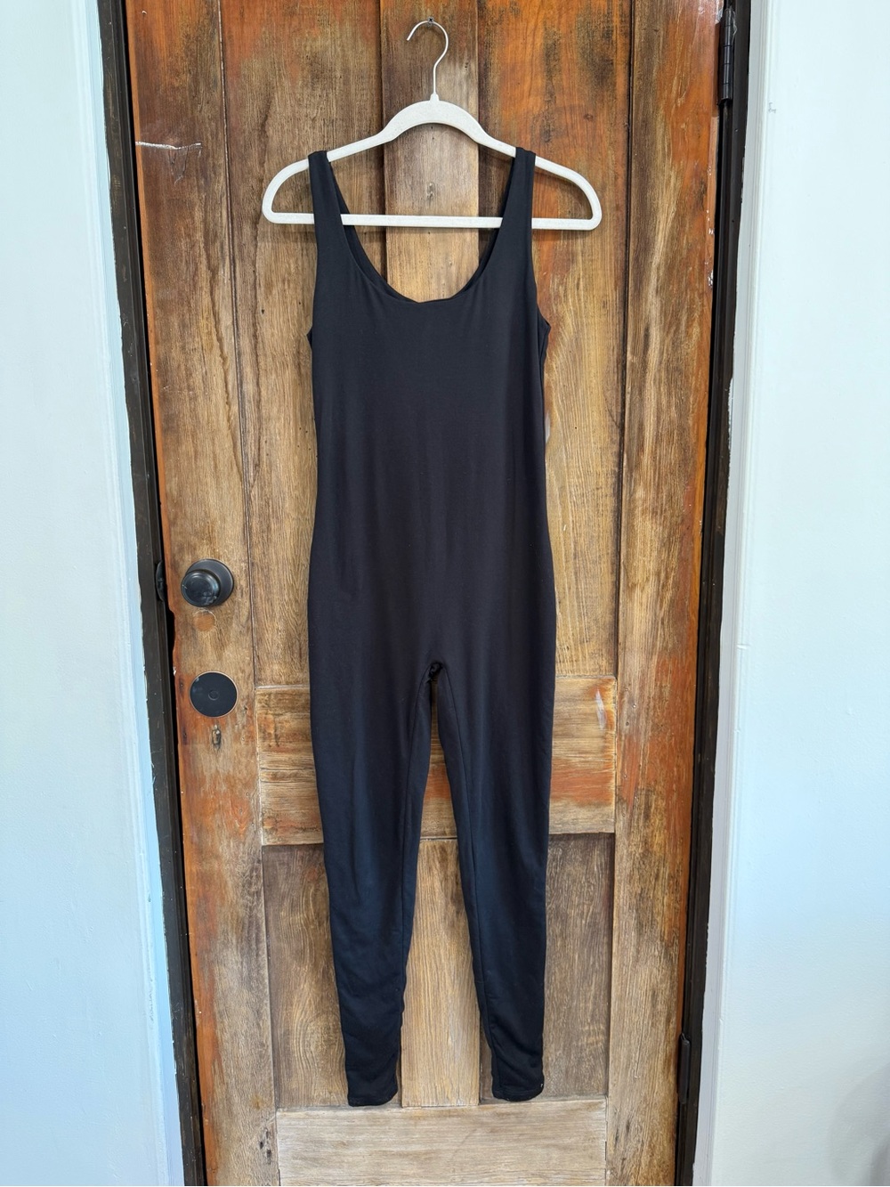 Sleek Black Scoop-Neck Stretch Jumpsuit